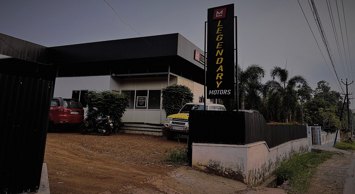 The Legendary Motors workshop and signage on the P.P Road